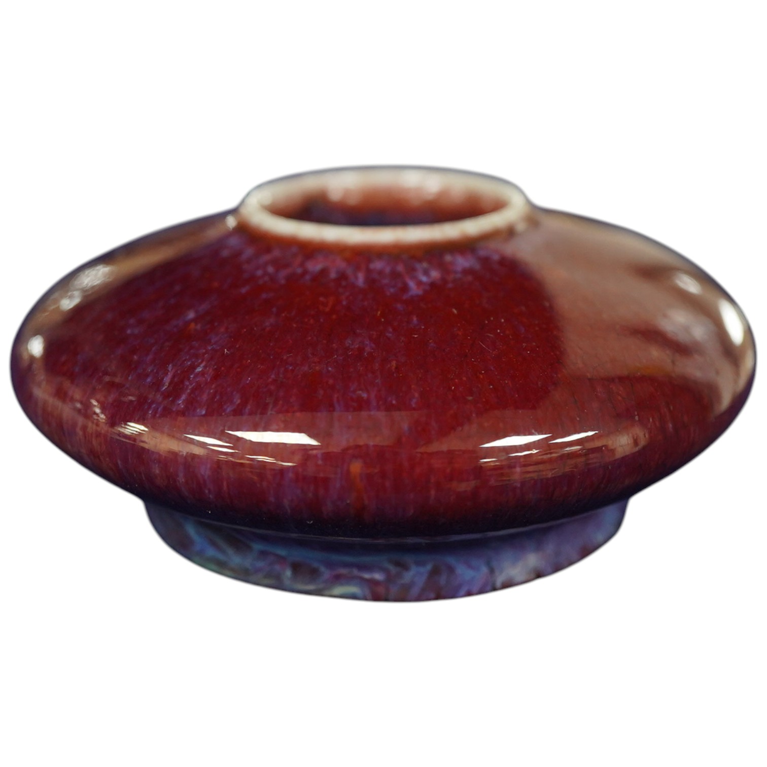 An 18th / 19th century Chinese flambé glazed brushwasher, 9cm diameter